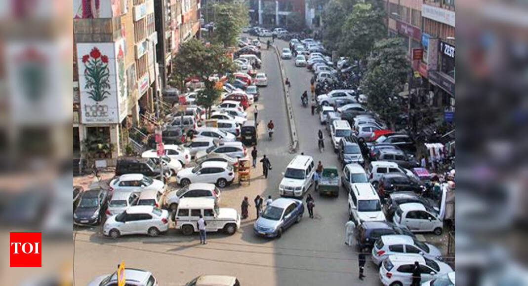 Noida revises parking rates, cars line up roads Noida News Times of