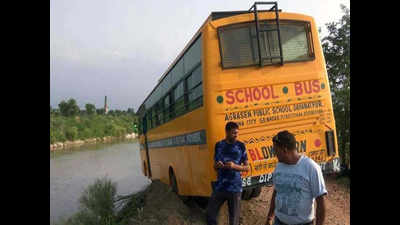 Bus skids to canal edge on dug-up road, 35 kids rescued via window