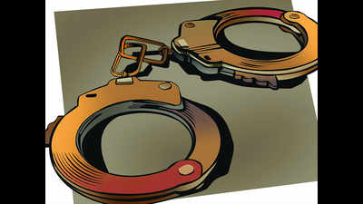 Cops, 2 others booked for bid to rob a man held with liquor