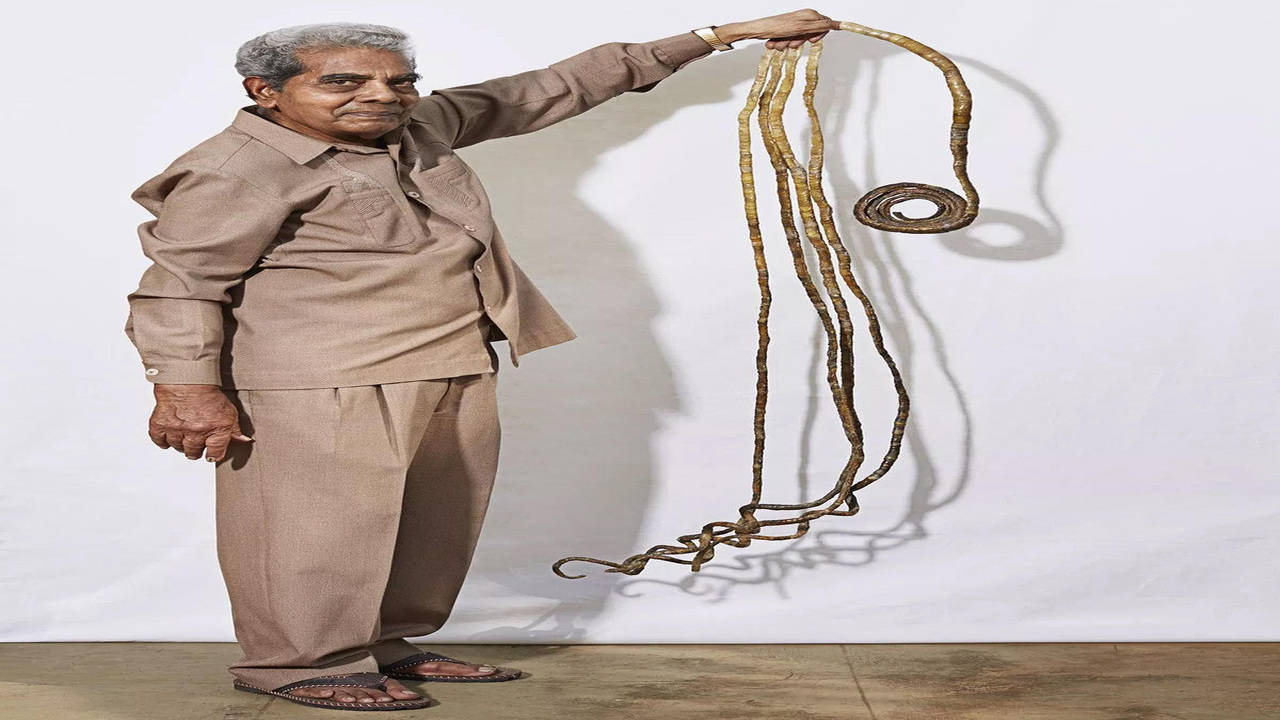 Indian man cuts 77-inch long nails after growing them for 66 years | Daily  Mail Online