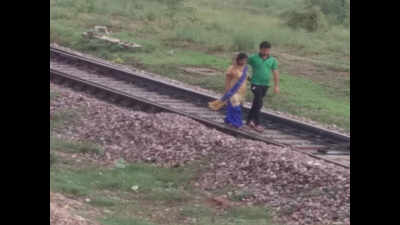 Couple jumps in front of train in ‘suicide pact’, dies