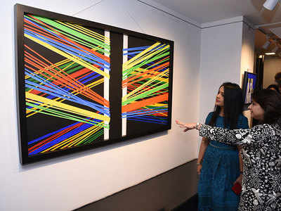Celebrities attend charity art event in the city