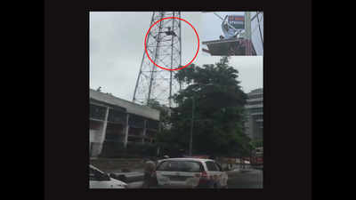 Watch: Man climbs tower near Metro Bhawan in Delhi, demands special status for Andhra Pradesh