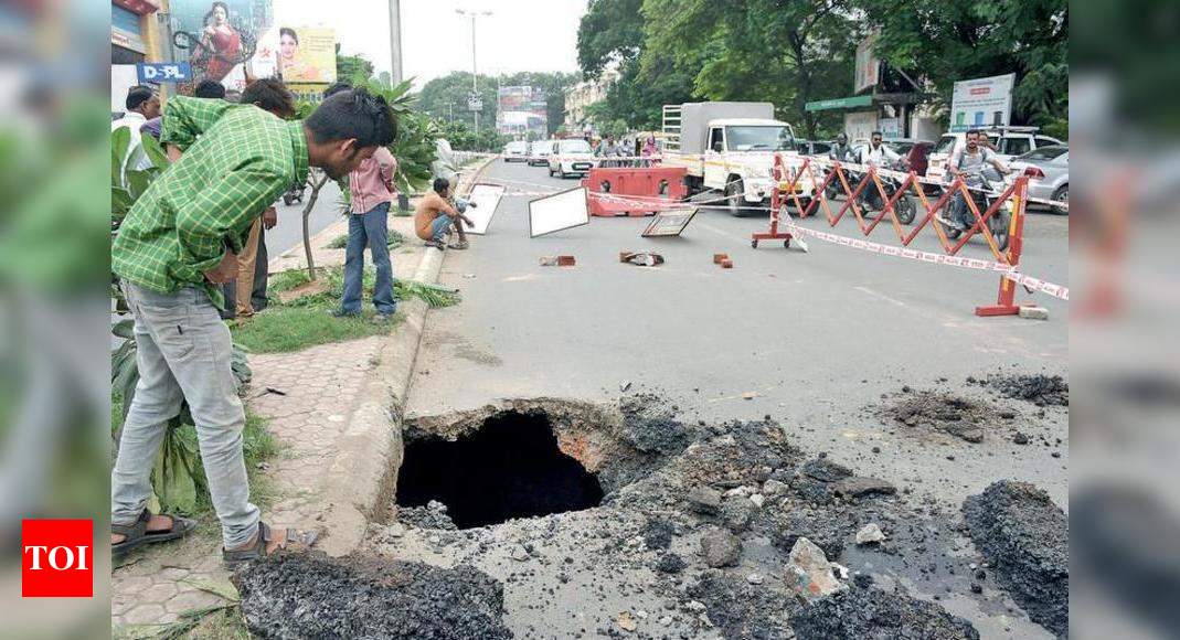 Cave-ins lead to traffic snarls on OP Road | Vadodara News - Times of India