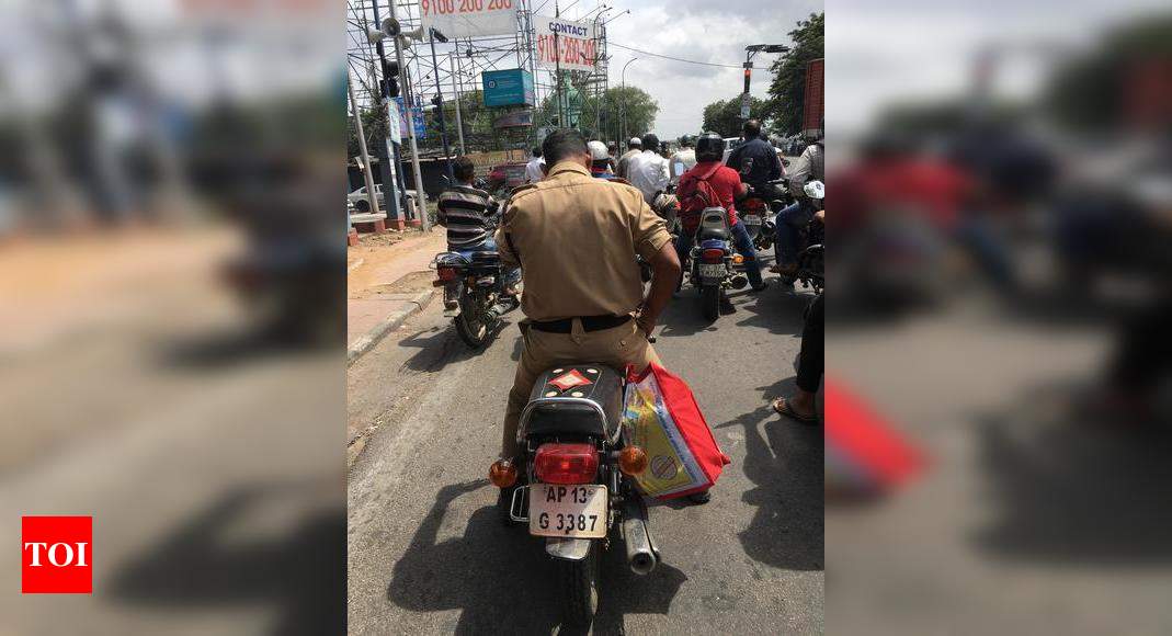 cop without helmet - Times of India