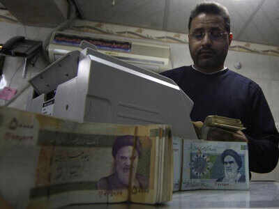 Iran S Rial Hits Record Low 1 00 000 To The Dollar Times Of India Iran S Rial Hits Record Low 1 00 000 To