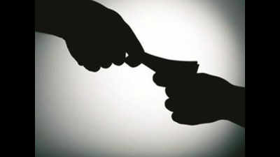 Home ministry officer held for taking bribe