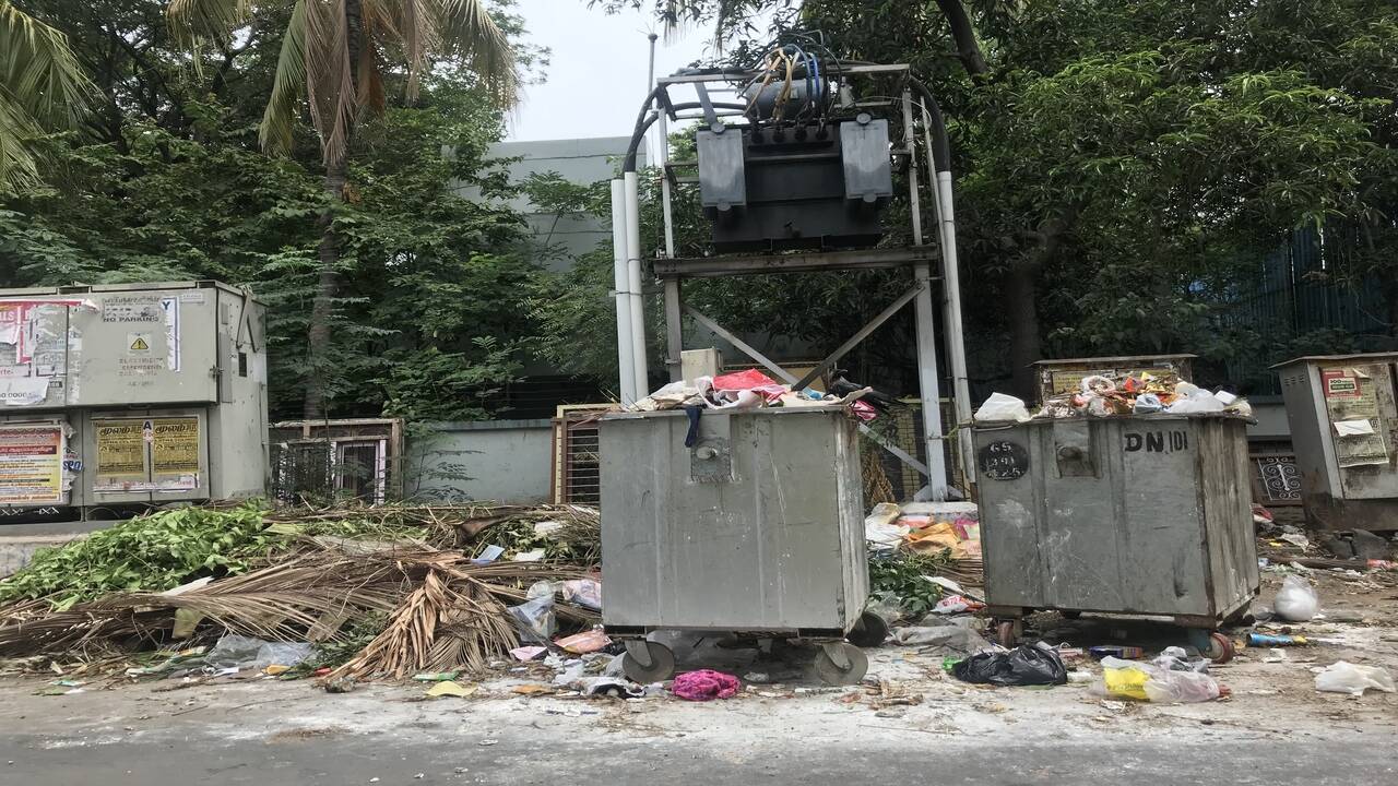 overflowing trash bin Times of India