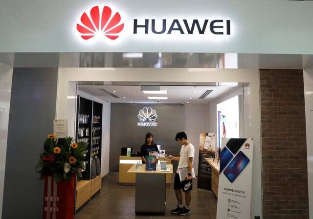 A Huawei shop is pictured in Singapore August 8, 2018. REUTERS/Edgar Su A Huawei shop is pictured in Singapore August 8, 2018. REUTERS/Edgar Su