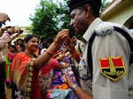 Women tie rakhis to jawans, police personnel