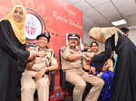 Women tie rakhis to jawans, police personnel