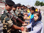 Women tie rakhis to jawans, police personnel