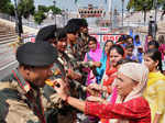 Women tie rakhis to jawans, police personnel