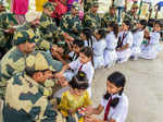 Women tie rakhis to jawans, police personnel