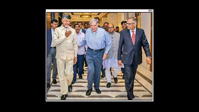 Naidu builds new 'bond', woos Tata to invest in AP