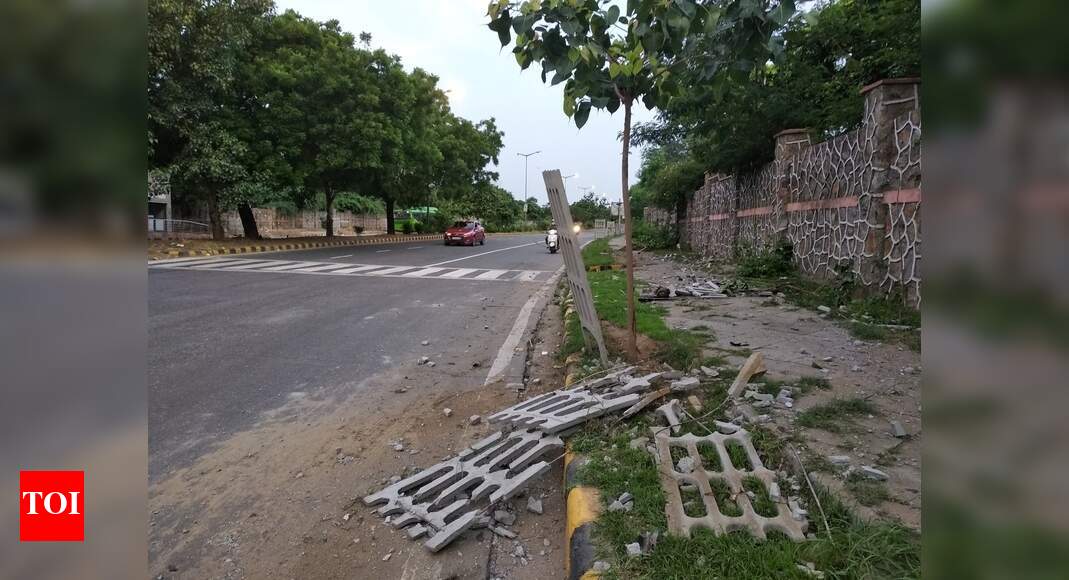 Broken tree guard - Times of India
