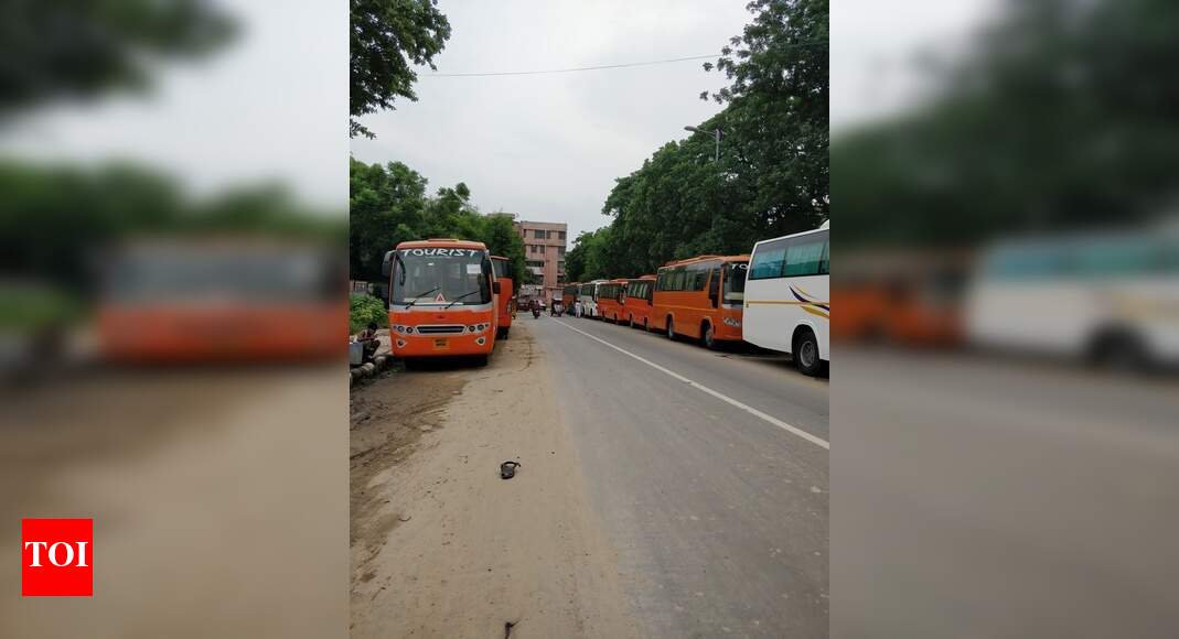 Road permanently occupied by buses - Times of India