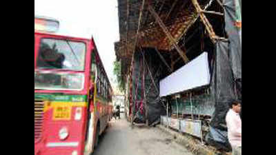 Portions of two Ganpati pandals on pedestrian space dismantled