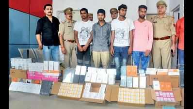 4 fled with truck carrying mobile phones, arrested