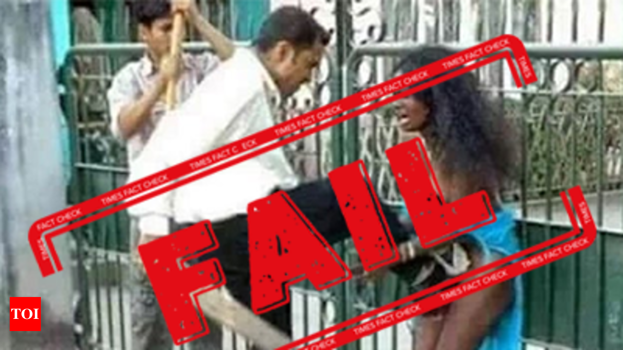 FAKE ALERT: Photo of tribal girl paraded naked in Assam being used to  malign Congress in Bengal - Times of India