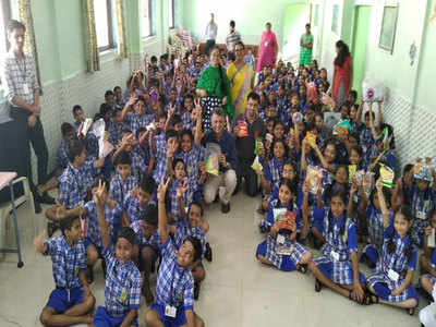 School kids learn to recycle wrappers and aim to reduce environment pollution