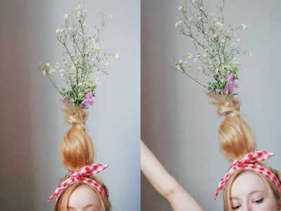 Would you wear a vase of flowers on your hair?