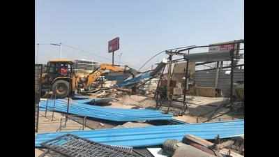 Shops razed to clear way for link to Dwarka e-way