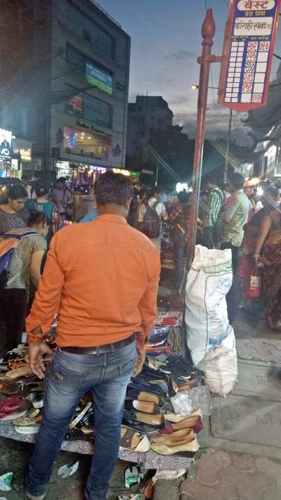 Bus stop encroached by hawkers ..