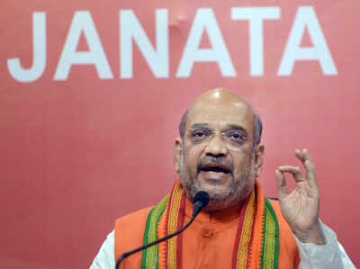 Amit Shah challenges Congress to open debate on development