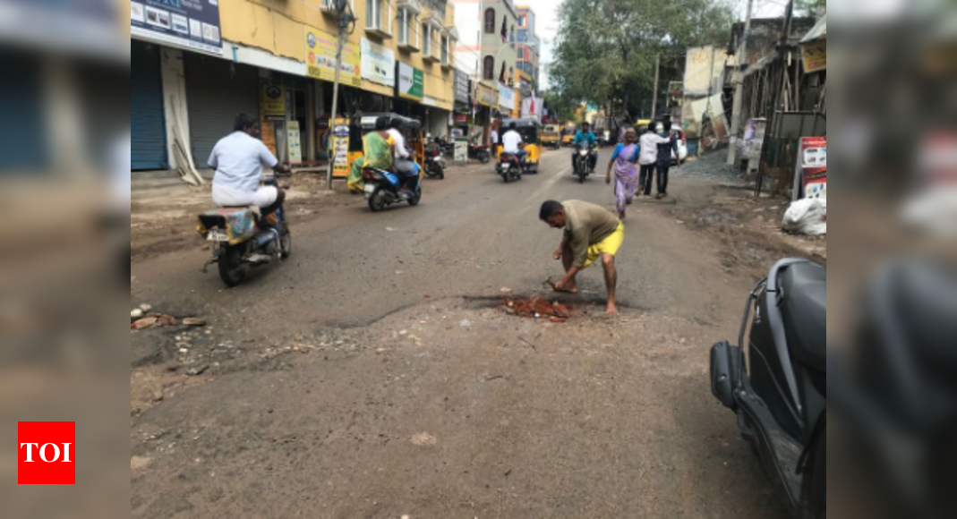 Auto driver friends repair damaged Chennai road Chennai News - Times 