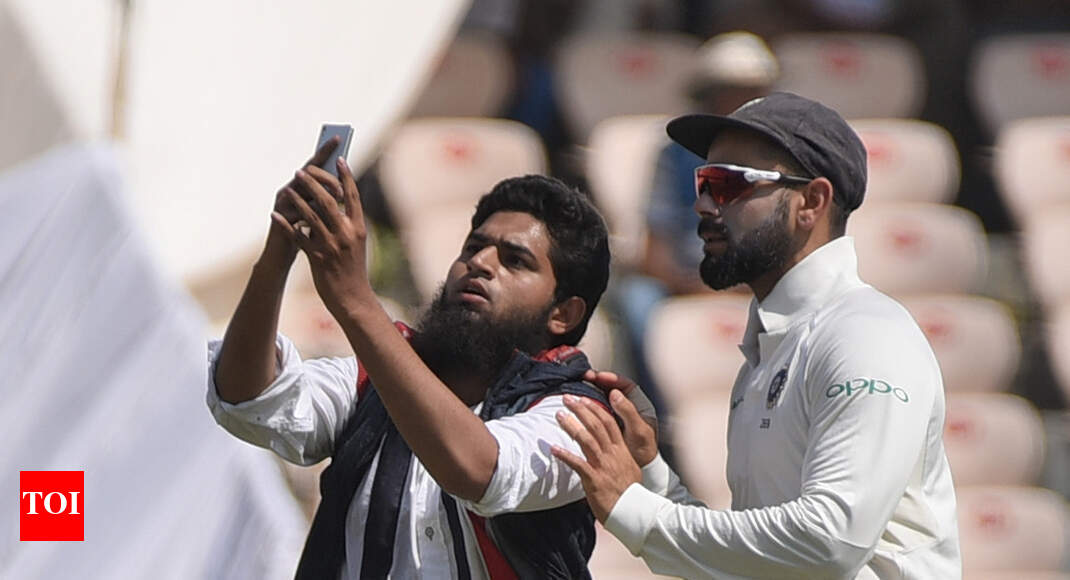 Selfie with Virat Kohli: Case filed against fan - Times of India