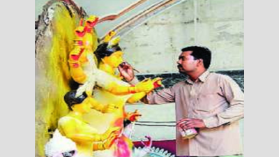 Muslim sculpts a harmonious future with idols of Durga