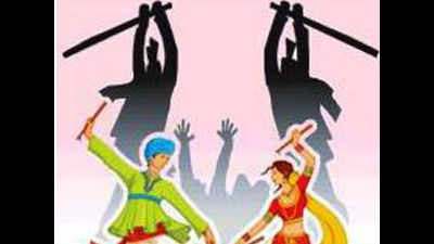 Man stares at ex-wife in garba, gets a beating by her current husband