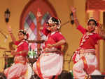 Artistes perform at a grand show to mark Durga Puja celebrations