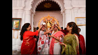 Sindur Khela at pandals on last day of Durga Puja