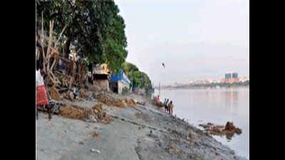 KMC tips help ghat clean-up on other side of the Hooghly