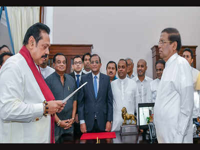 Sri Lankan President Maithripala Sirisena sacks Ranil Wickremesinghe, appoints Mahinda Rajapaksa as new PM