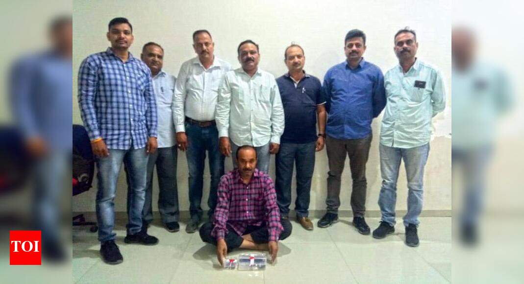 Man carrying pistol, seven cartridges arrested | Vadodara News - Times ...