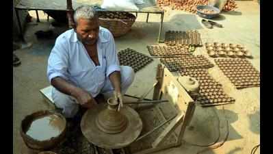 Fading demand for diyas spells darkness for potters this Diwali