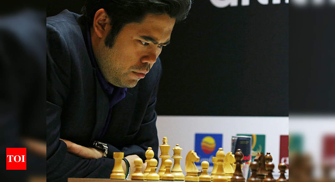 Viswanathan Anand draws with Hikaru Nakamura to stay in joint lead