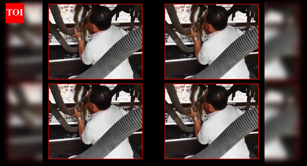 Miraculous escape for guard as train starts moving while he fixes pipe ...