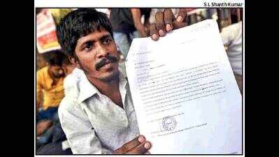 Want justice, says sanitation worker fired over manhole row