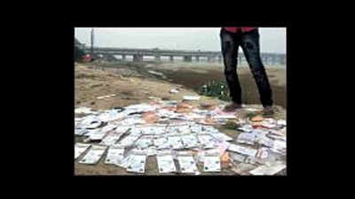 Postman dumps dozens of undelivered Aadhaar cards on Ramganga banks, probe on