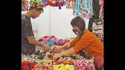Shrunk to a fourth in size, trade fair tries to make space for all