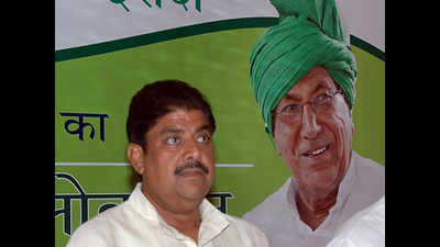 Ex-Haryana CM O P Chautala expels son Ajay Chautala from party
