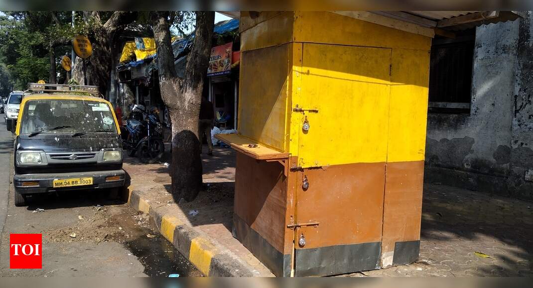 illegal encroachment on footpath - Times of India
