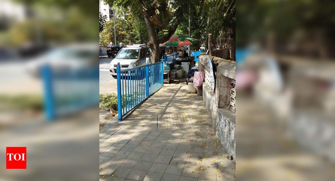 footpath encroached - Times of India