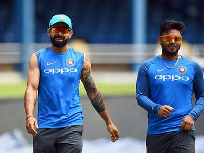 Virat Kohli posts photo with Rishabh Pant, calls him 'champion' | Cricket  News - Times of India