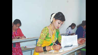 Karnataka: Bride writes university exam just after her wedding
