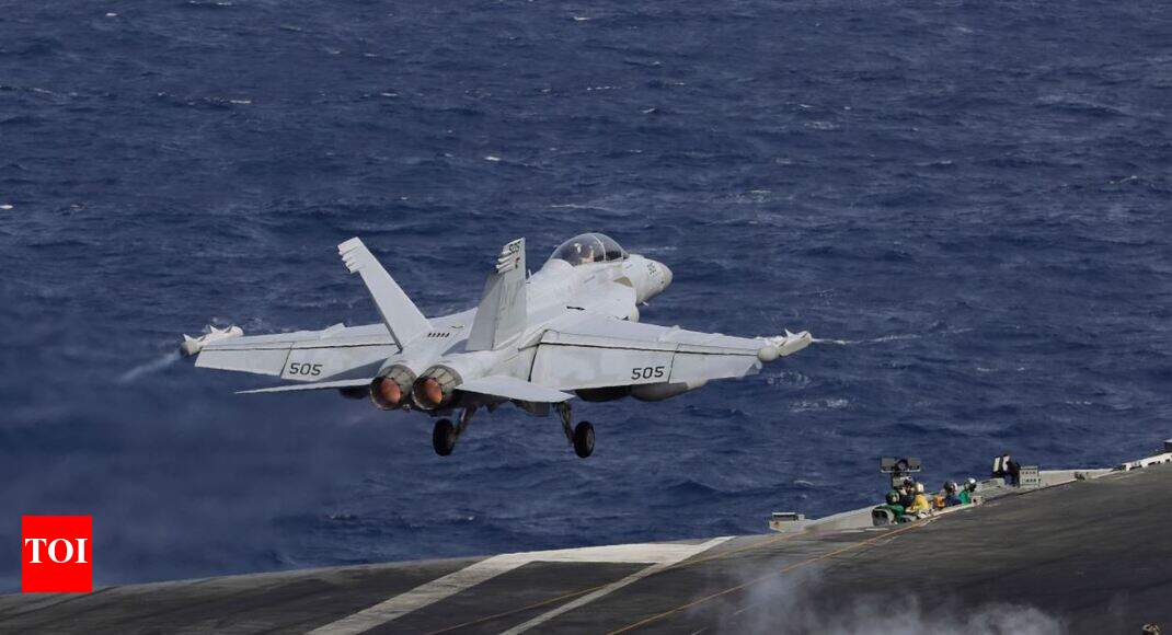 US carrier in Hong Kong after bombers fly over South China Sea